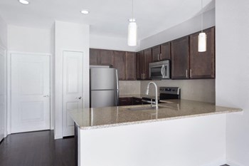 Modern Kitchen with Island Modern Kitchen with Island at Allora Bella Terra, Richmond, TX - Photo Gallery 4