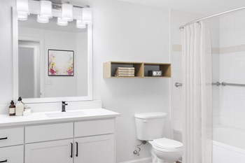 Renovated bathroom with white cabinets - Photo Gallery 5