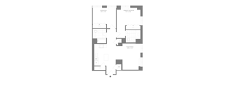 A floor plan of a building with multiple rooms and corridors.
