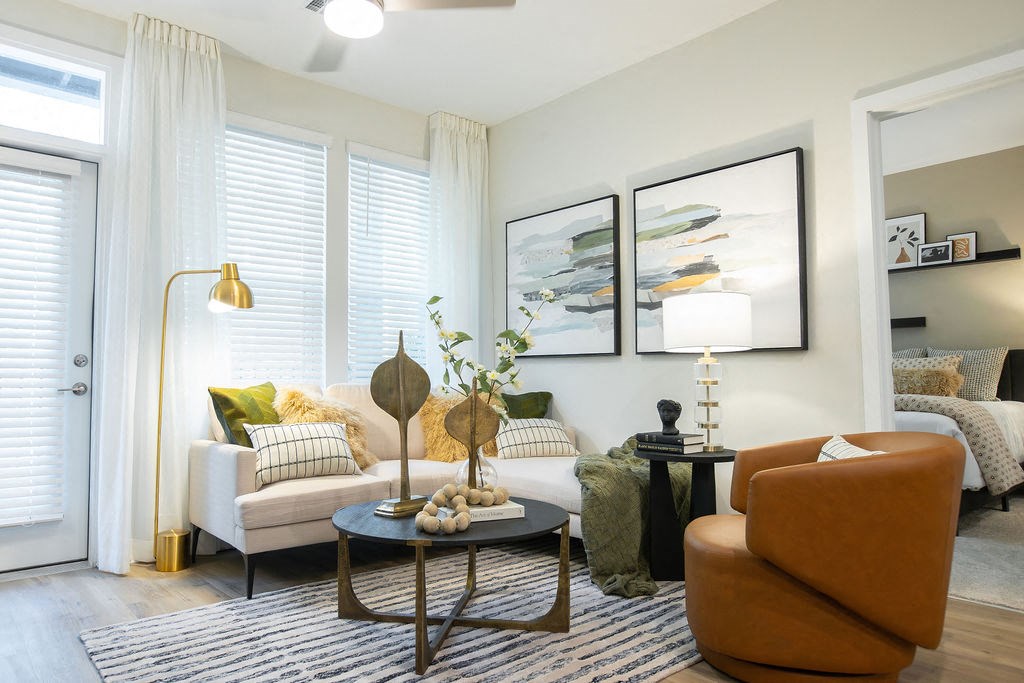 a living room with a couch and a table