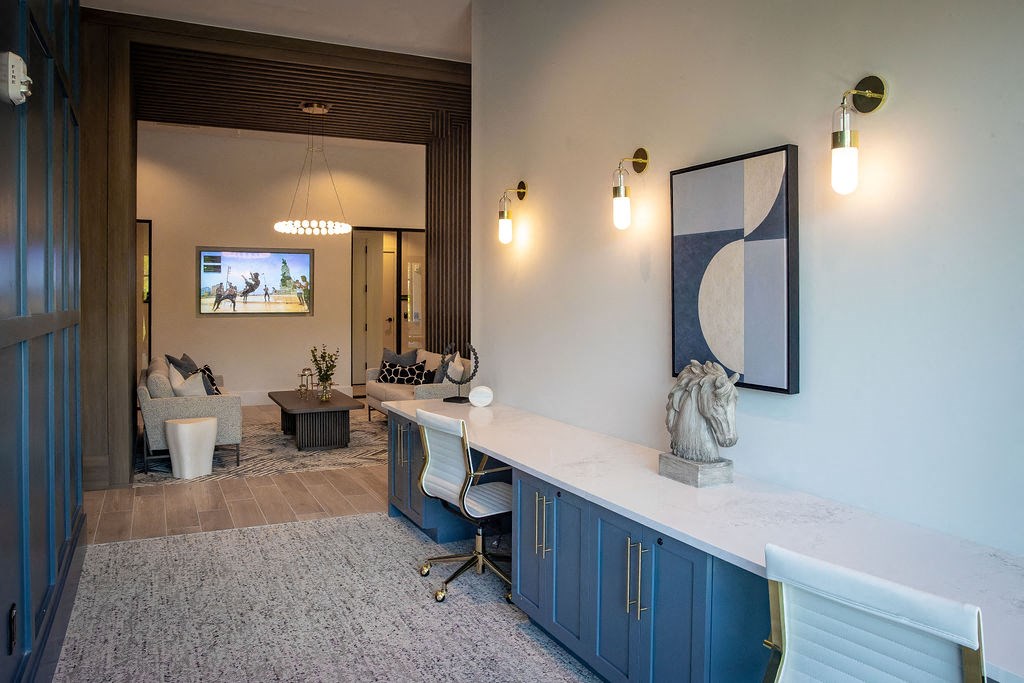 a living room with blue cabinets and a white counter top