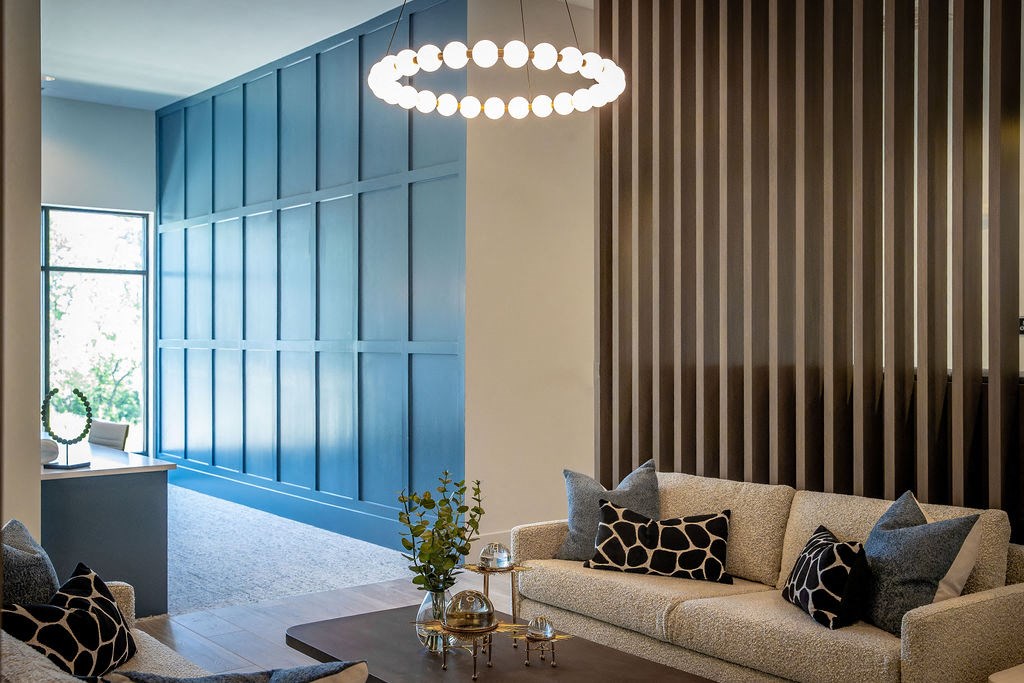 a living room with a couch and a table