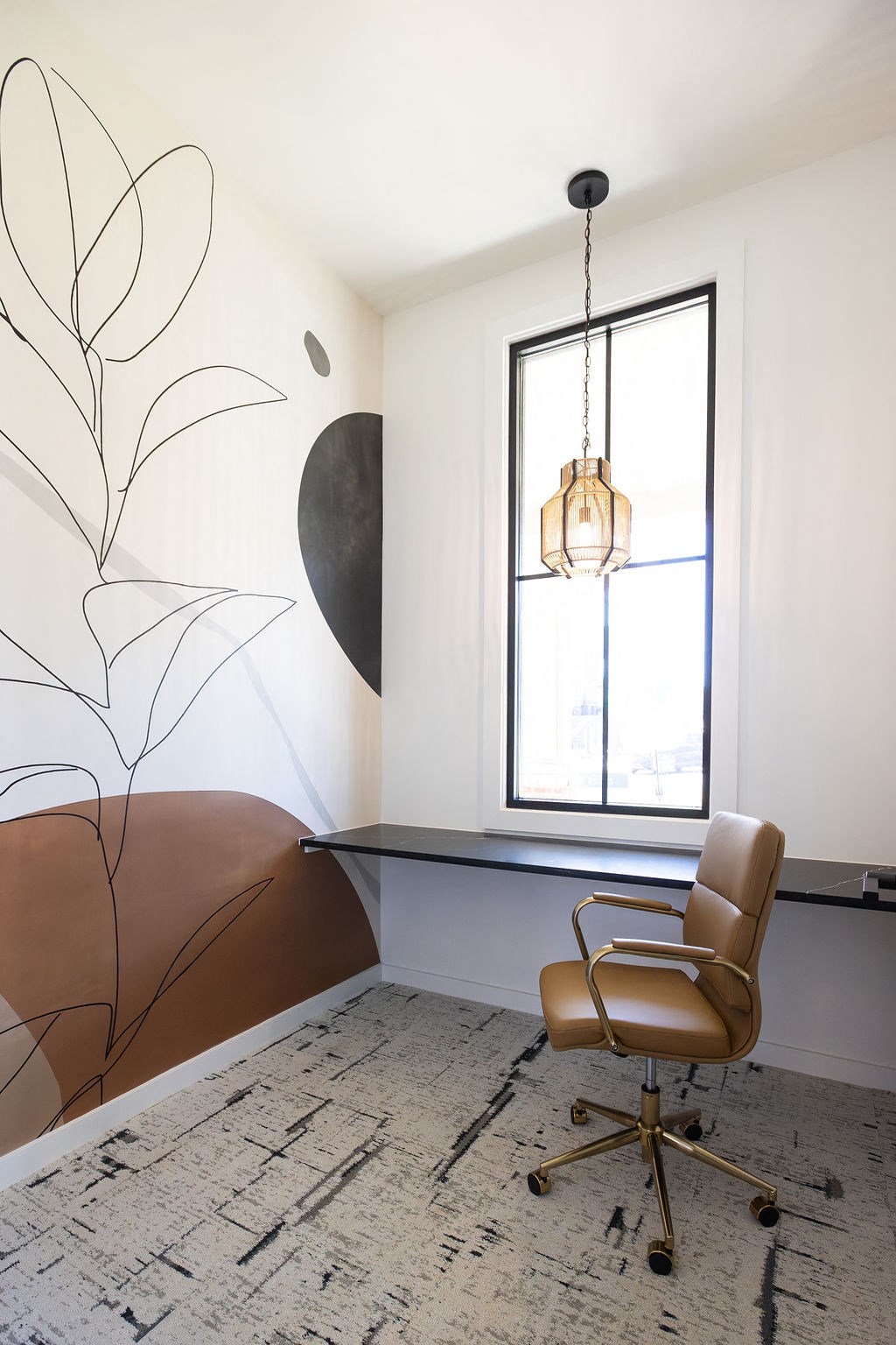 a chair and a window in a room