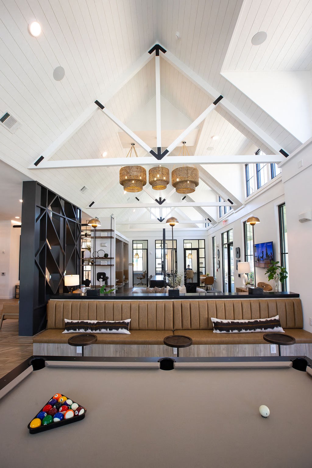 the lobby of a hotel with a couch and table
