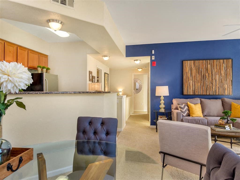 model unit - view of kitchen, dining room, and living room