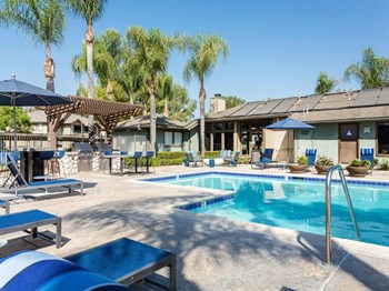 Pool Side Relaxing Area With Sundeck Pool Side Relaxing Area With Sundeck at The Ashton, Corona - Photo Gallery 6