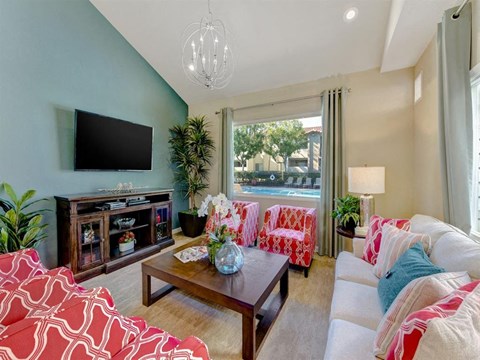a living room with a couch and a television