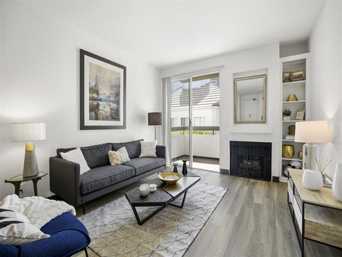 a living room with a couch and a fire place