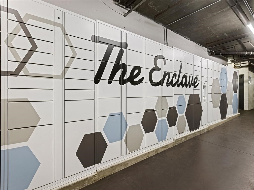 a wall at the end of a corridor with a large sign that says the end on it at Enclave, California, 90723