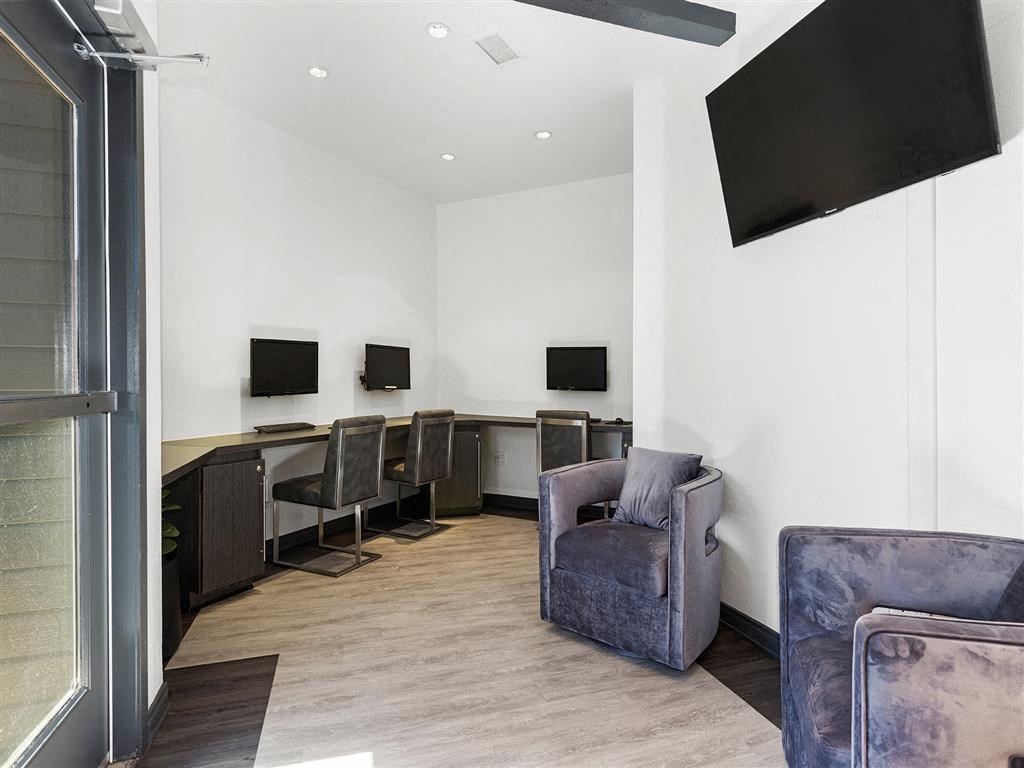 a room filled with furniture and a flat screen tv at Enclave, California, 90723