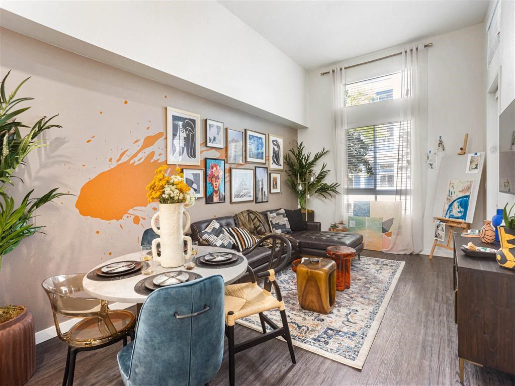 a living room with a table and a couch