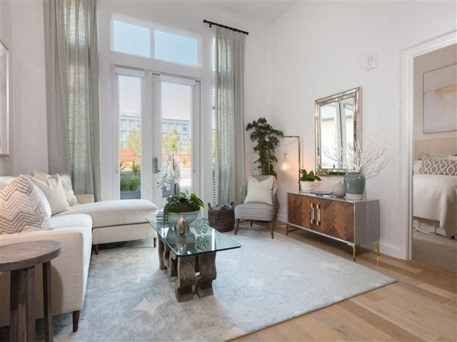 a living room with a couch and a table