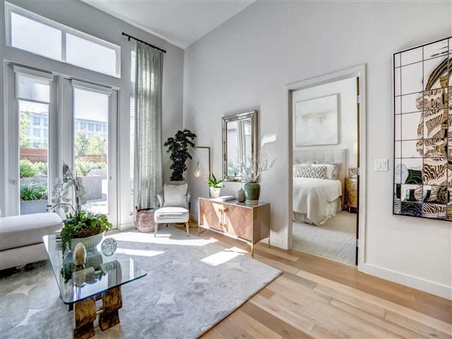 a living room with a couch and a table