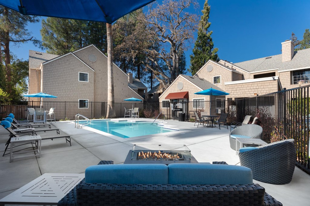 our apartments have a pool and lounge area with furniture