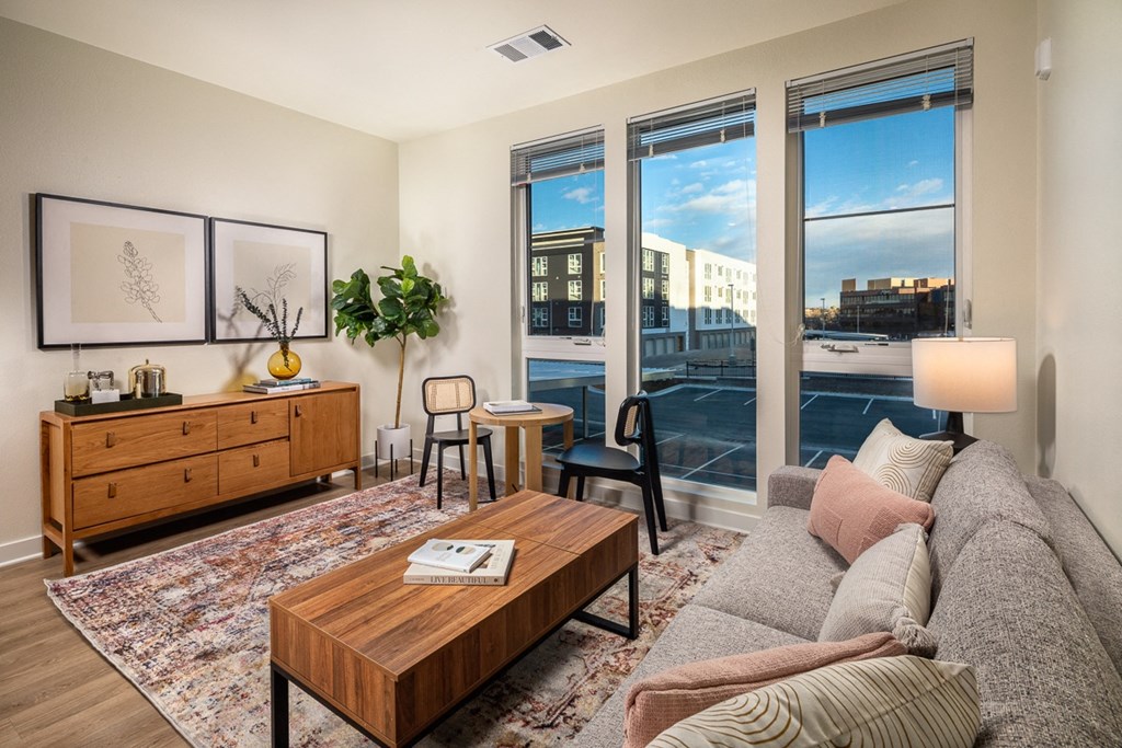 Living room with floor to ceiling windows