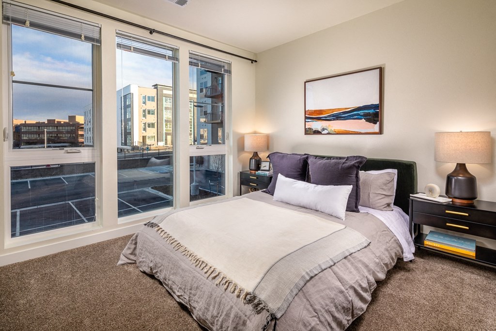 Bedroom with floor to ceiling windows