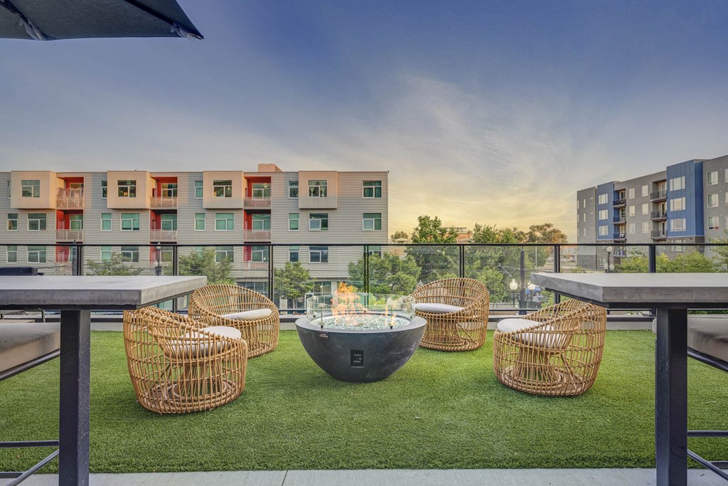 a view of a balcony with a fire pit