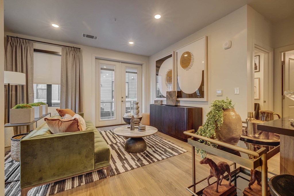 a living room with a couch and a table