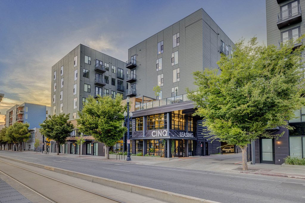 a photo of a building on the corner of a city street
