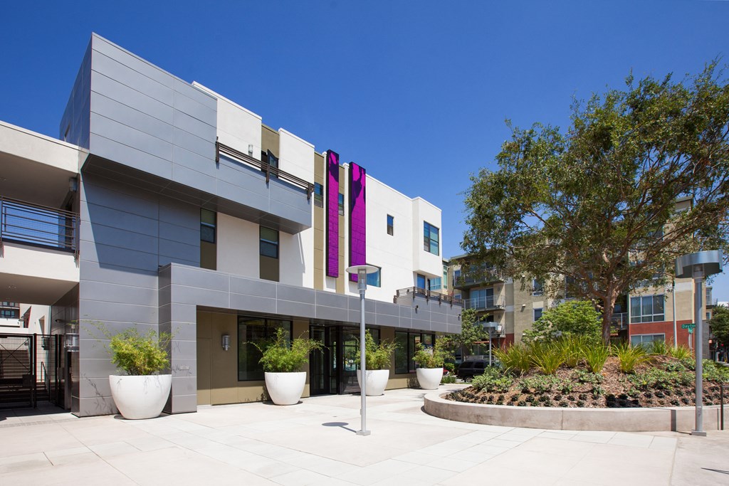 a picture of the front of the building with a blue sky in the background