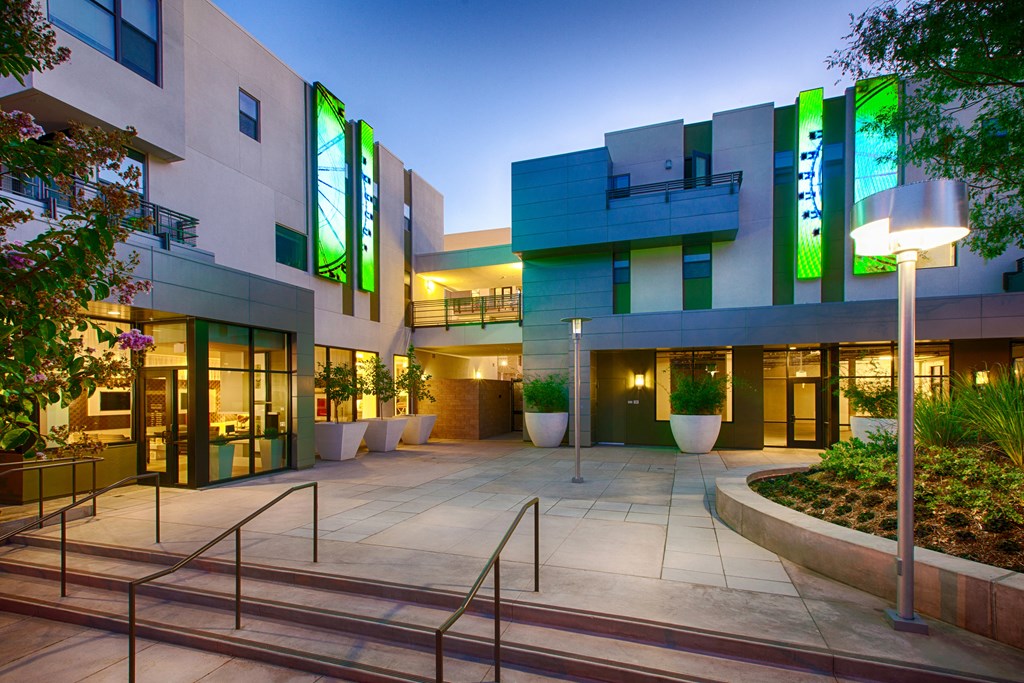 a picture of the front of the building at night
