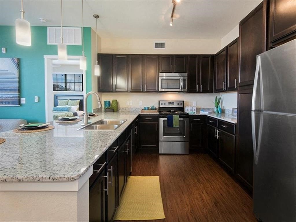 model kitchen stainless steel appliances with black cabinets