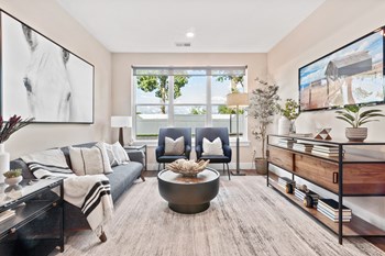 Livingroom model with modern furnishings and wood style plank flooring - Photo Gallery 3