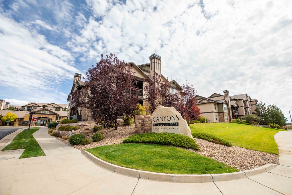 A large building with a sign that says Canyons in front of it.