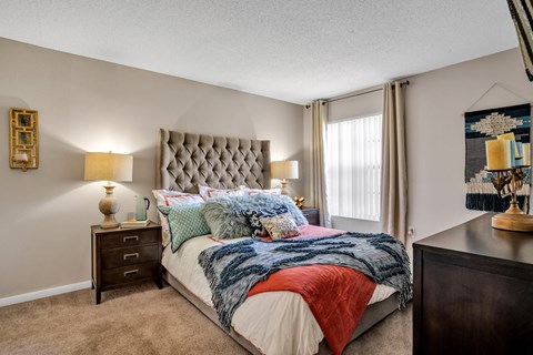 our apartments offer a bedroom with a king sized bed  at Castilian Apartments, Orlando, FL, 32839