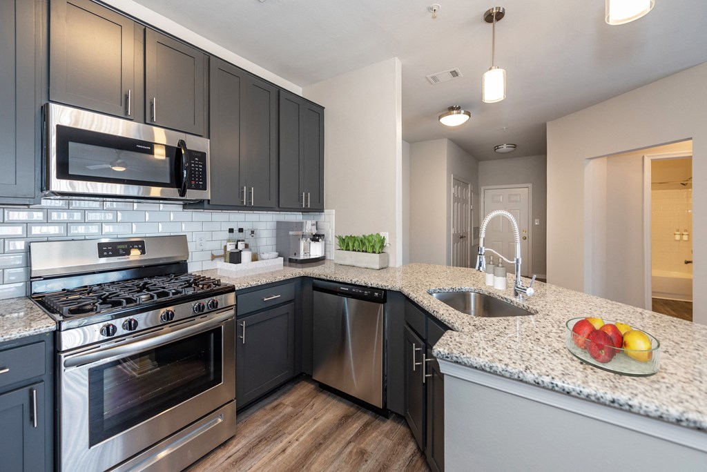 Kitchen with plenty of counter space and stainless steel appliances