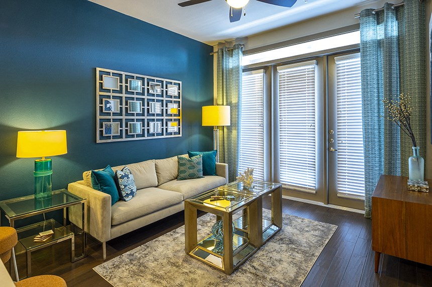 a living room with a couch and a table