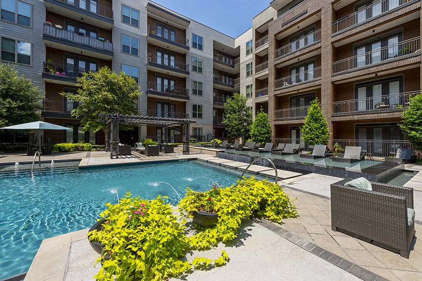 our apartments have a large pool and lounge chairs