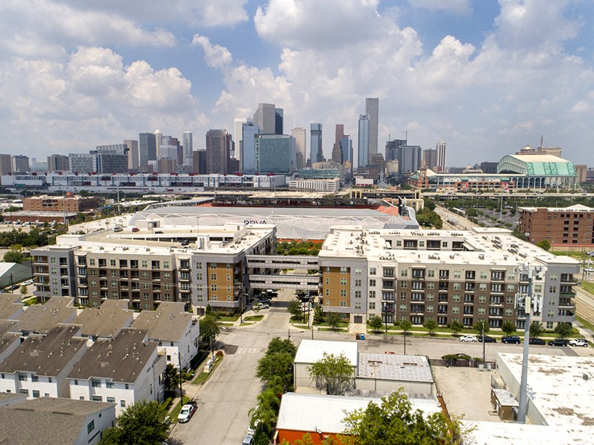 the skyline with apartments in the foreground and skyscrapers