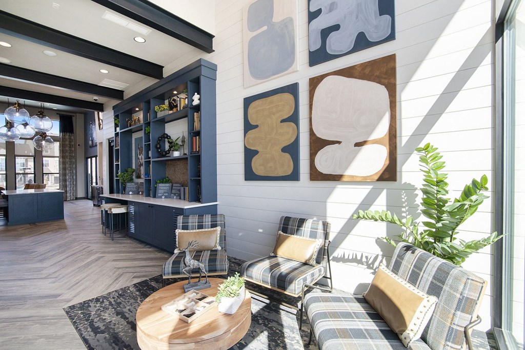 a living room with couches and a coffee table