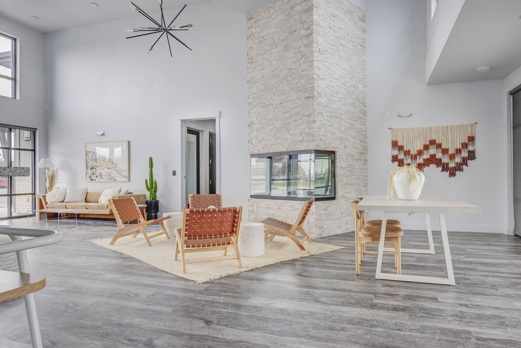 a living room with white walls and hardwood flooring at Copper 87, West Jordan, UT