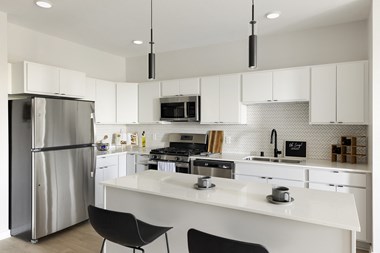 Beyond Woodbury Kitchen with Modern Matte Black Fixtures