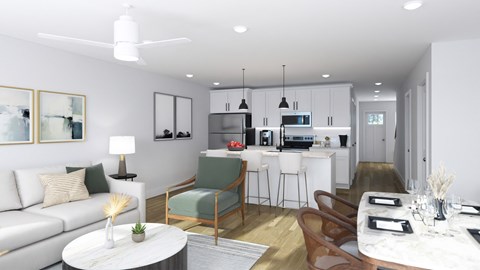 A modern living room with a white couch and a coffee table.