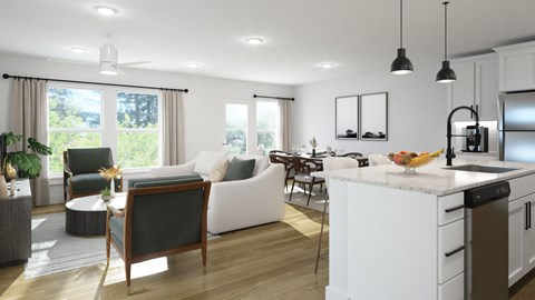 A modern kitchen with white cabinets and a large island.