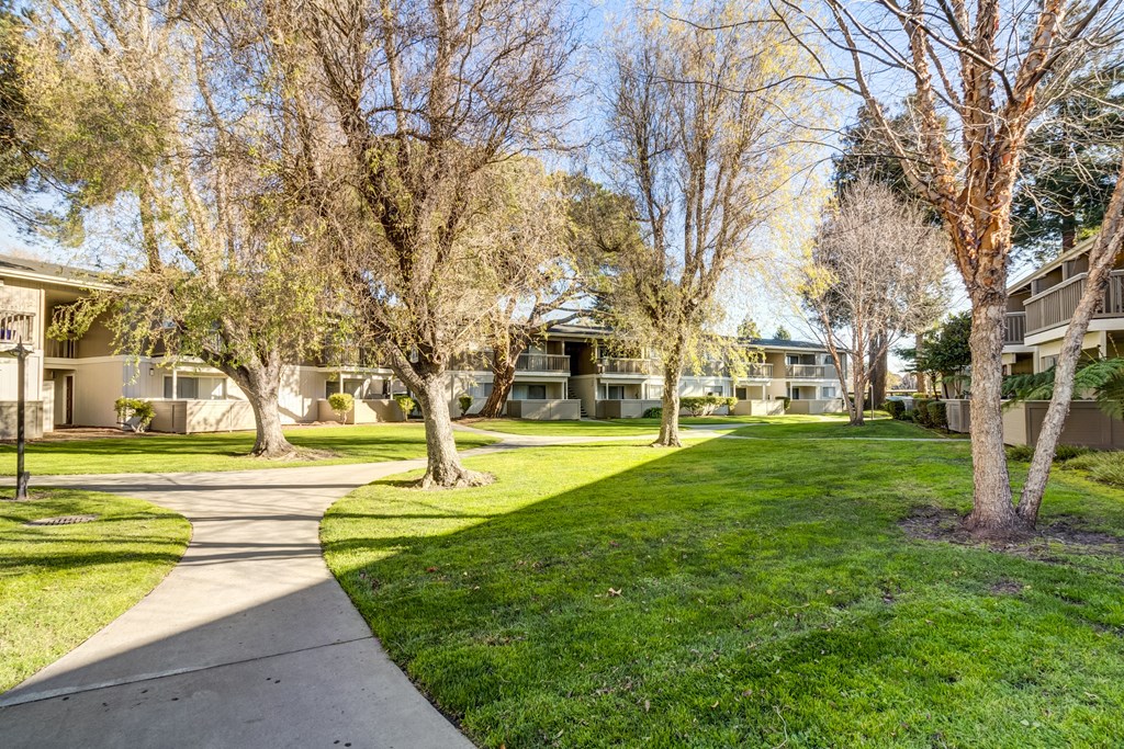 A residential area with houses and trees.