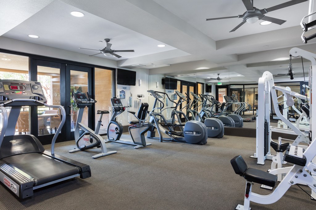fitness center with cardio and weights