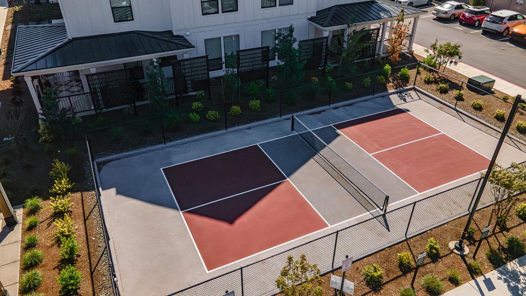 an aerial view of two tennis courts on a parking lot at The Farmstead, Vancouver
