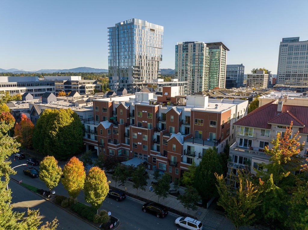 A cityscape with a mix of modern and traditional buildings.