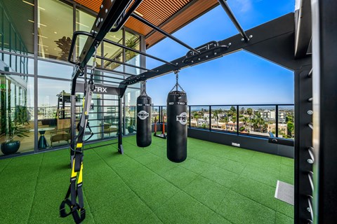 A gym with a view of the city.