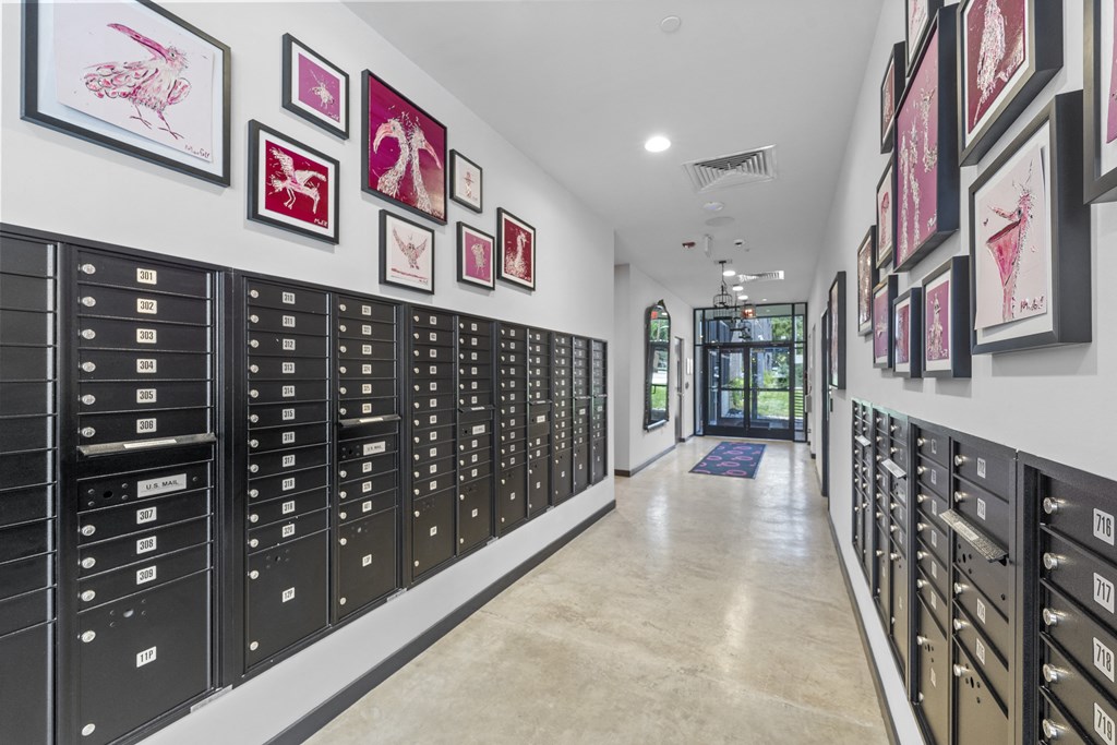 a look down the hallway of the locker room at the retreat at thousand oaks apartments