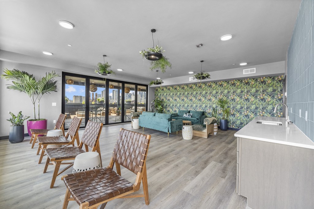 a room filled with furniture and a large window