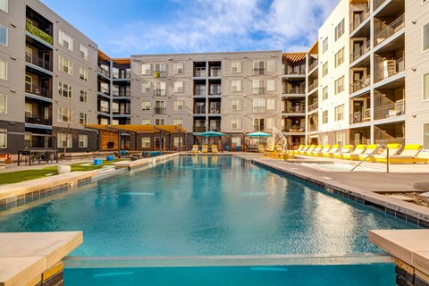 A large indoor swimming pool in a residential building.