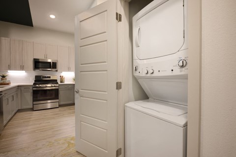 a white refrigerator freezer sitting inside of a kitchen