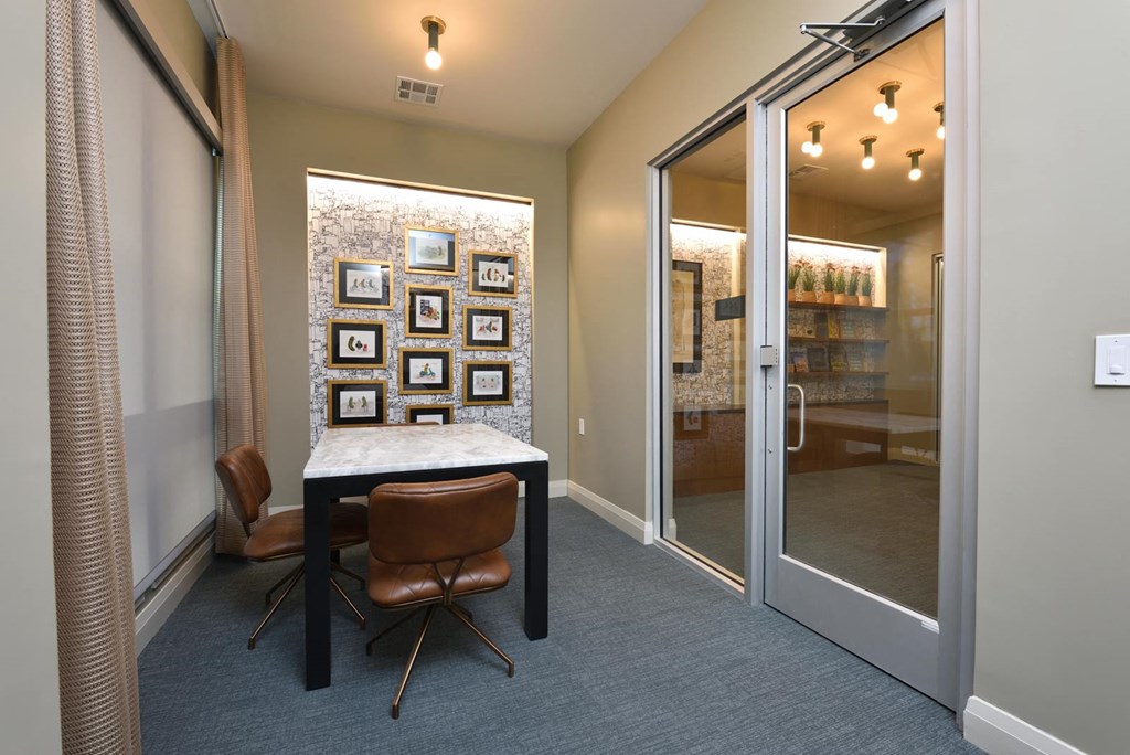 Clubhouse decor with wall frames at The Flats at West Alabama, Houston, TX, 77027