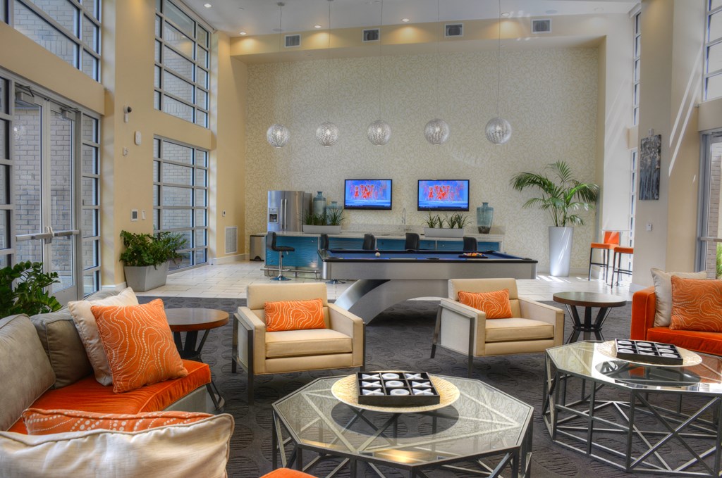 Resident lounge and kitchen with flat screen tvs
