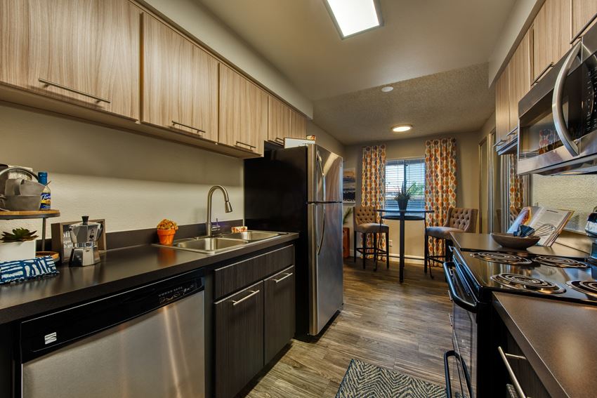 Apartments in Scottsdale for Rent - Denim Scottsdale Modern Kitchen with Up-to-Date Appliances, Sleek Countertops, and Ample Cabinet Storage - Photo Gallery 1